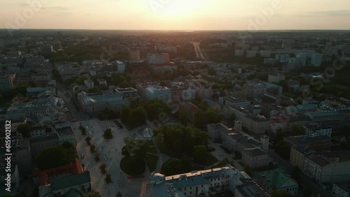 downtown plac litewski, city square and park at sunset, Lublin, Poland photo