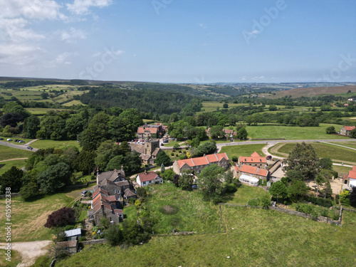 Aerial View Goathland. Goathland is a village and civil parish in the Scarborough district of North Yorkshire  England. Historically part of the North Riding of Yorkshire  