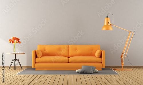 Fototapeta Naklejka Na Ścianę i Meble -  Modern living room with orange sofa and floor lamp - 3d rendering