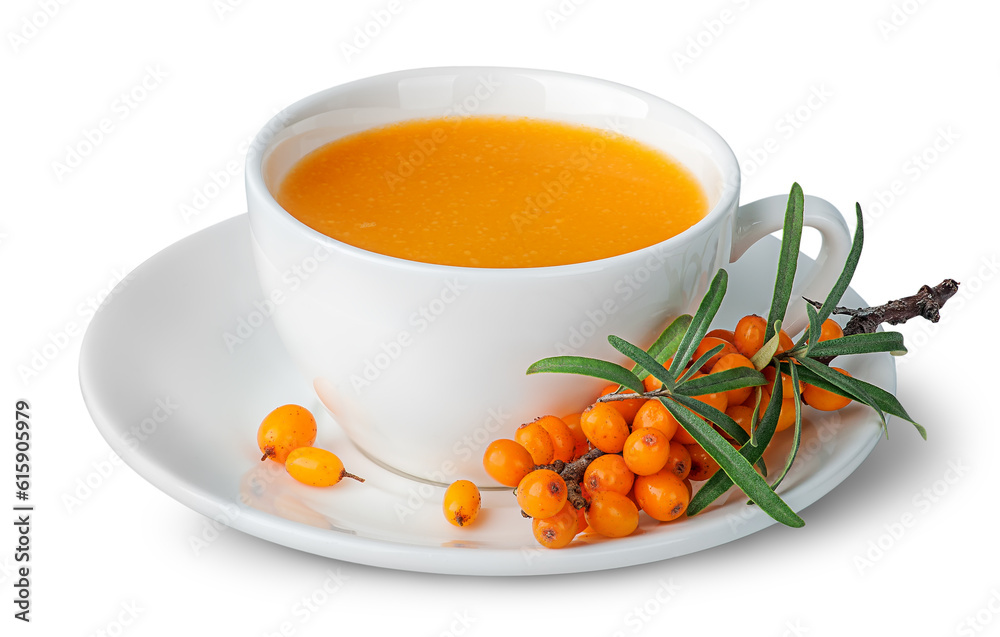 Juice from sea-buckthorn in a cup with berries isolated on white background Juice from sea-buckthorn in a cup with berries isolated on white background