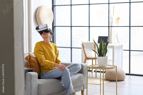 Pretty young woman in VR gl...