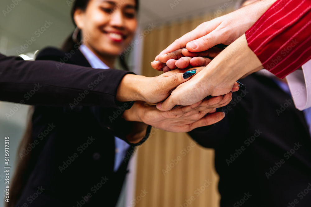 People putting their hands together. Friends with stack of hands ...