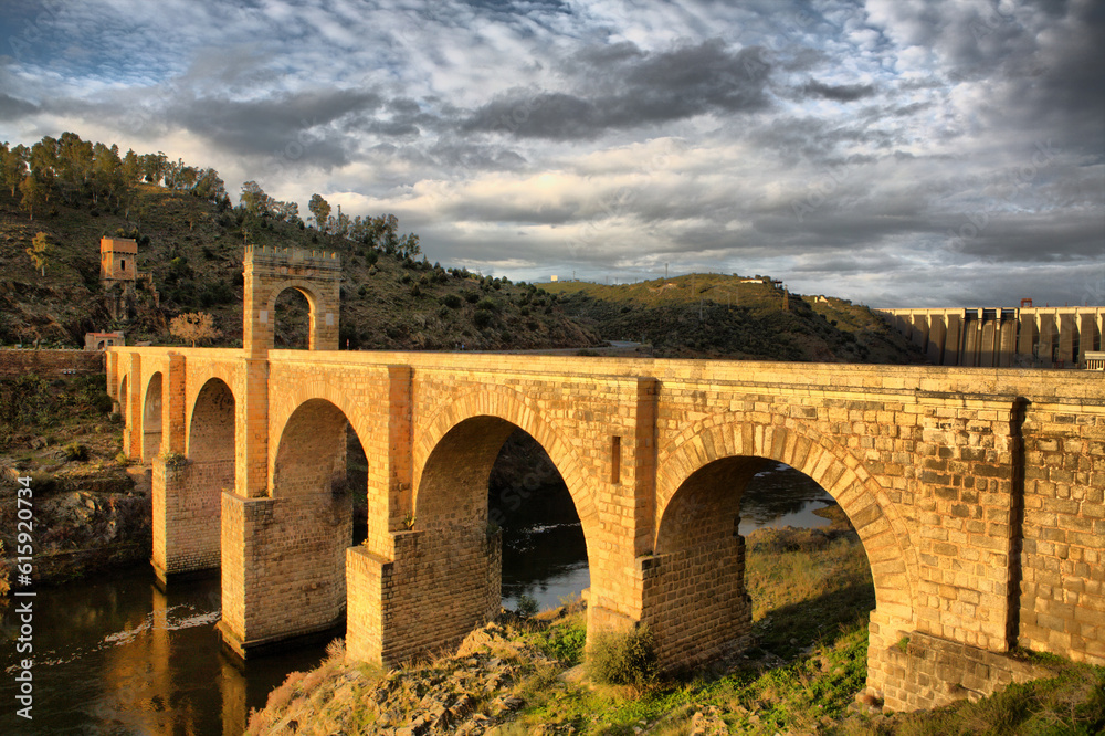 Fototapeta premium Roman bridge of Alcantara. Dates from de II century B.C. It was very important over the history as a strategic point to cross the Tagus river during Roman domination period in Spain. Caceres, Extremad