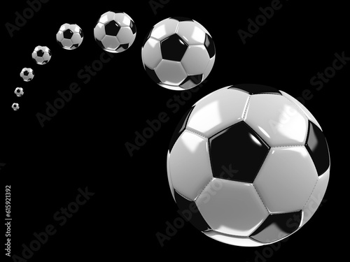 Flying soccer ball on the black background.
