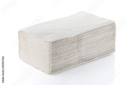 Paper napkins and towels in closeup on white. Close-up