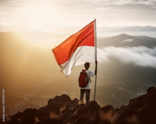 Indonesian Man Holding Indonesia Flag or Holding Flag of Indonesian with Indonesian mountain landscape photo