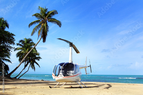 Small helicopter for excursions on a deserted beach. Dominican Republic