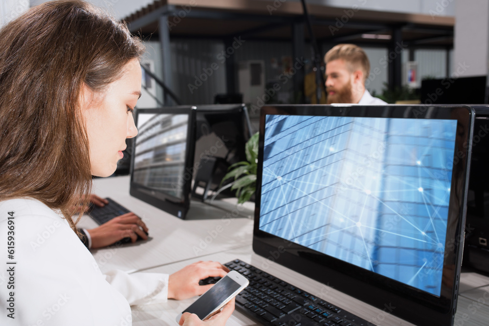 Businessperson in a modern office connected on internet network. concept of partnership and teamwork Businessperson in a modern office connected on internet network. concept of partnership and teamwork