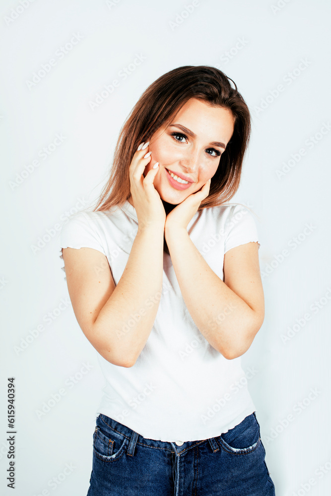 young pretty teenage girl posing cheerful happy smiling on white background, lifestyle people concept close up young pretty teenage girl posing cheerful happy smiling on white background, lifestyle people concept close up