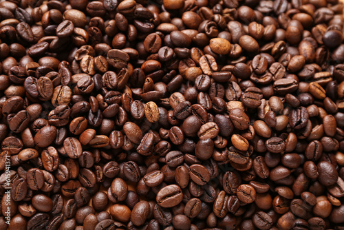 Texture of coffee beans as background