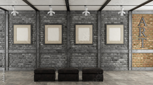 Art gallery in a loft with blank frame on black brick wall - 3d rendering
