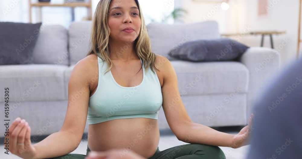 Pregnant woman, lotus and breathe on home floor with exercise partner, yoga and workout for wellness. People, zen meditation and pregnancy in living room for fitness, health and support in lounge Pregnant woman, lotus and breathe on home floor with exercise partner, yoga and workout for wellness. People, zen meditation and pregnancy in living room for fitness, health and support in lounge