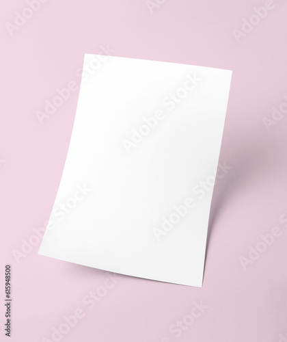 Fotografija The white blank document paper template with pink background