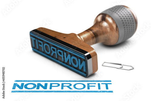 3D illustration of a rubber stamp over white background with the word nonprofit written in blue color photo