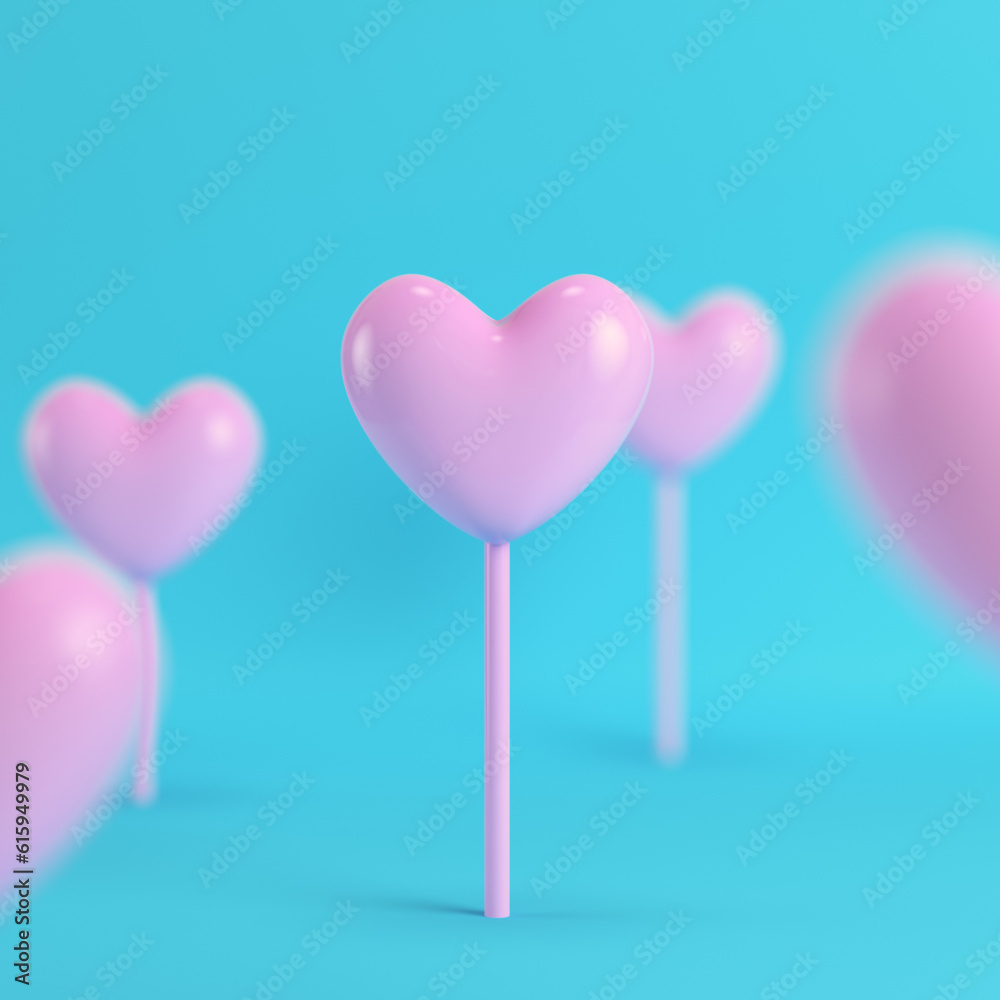 Pink hearts on a stick on bright blue background in pastel colors. Minimalism concept. 3d render