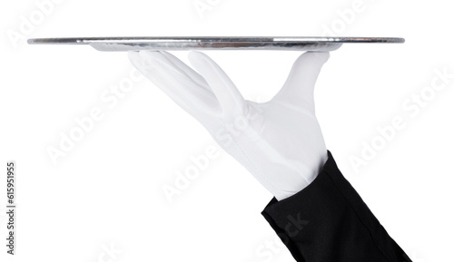Servant wearing white glove holds stainless steel tray on white background
