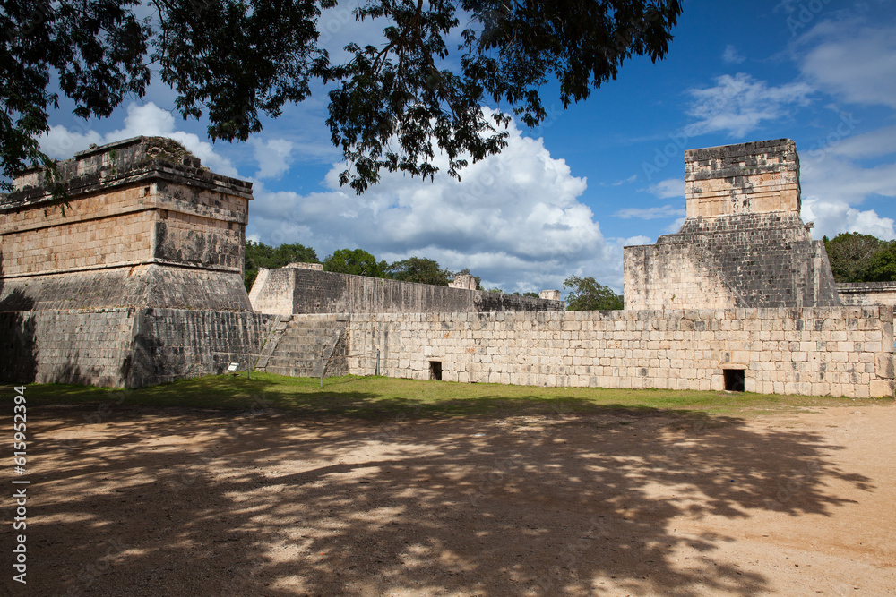 Majestic ruins in Chichen Itza,Mexico.Chichen Itza is a complex of Mayan ruins on Mexicos Yucatan Peninsula. A massive step pyramid, known as El Castillo or Temple of Kukulcan, dominates the ancient c
