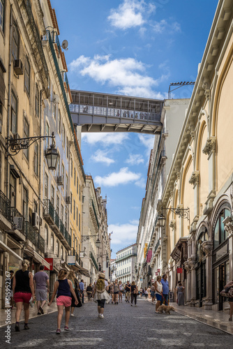 Fototapeta Naklejka Na Ścianę i Meble -  Santa Justa Lift is an elevator, or lift, in the civil parish of Santa Justa, in the historical city of Lisbon, Portugal. Situated at the end of Rua de Santa Justa, it connects the lower streets of th