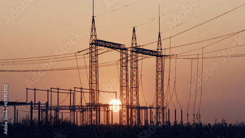 High voltage power lines at sunrise