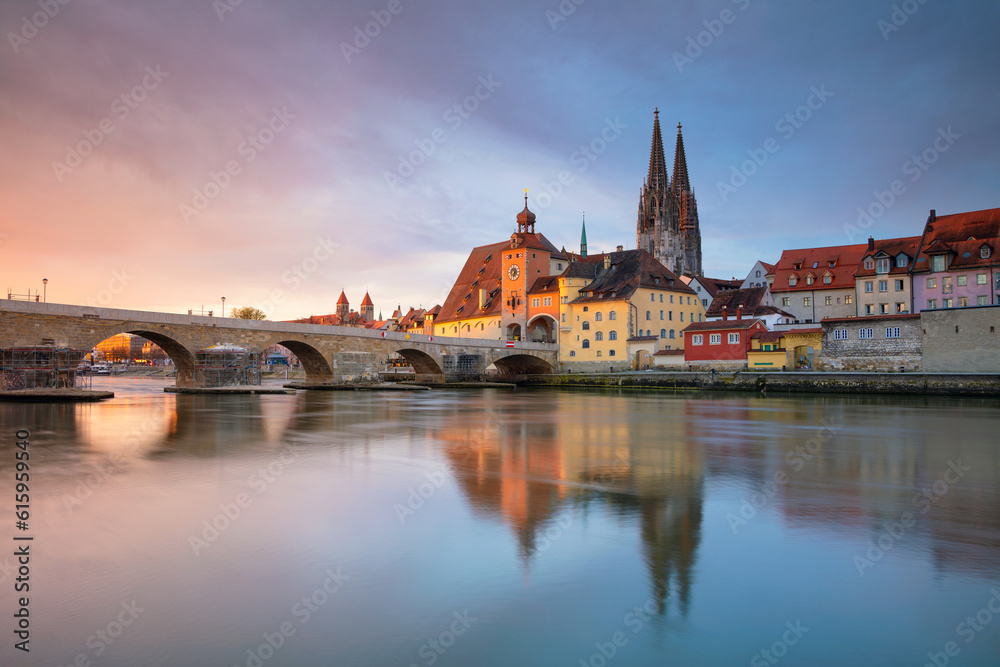 Cityscape image of Regensburg, Germany during spring sunrise.