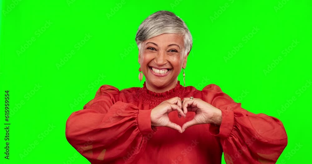 Face, green screen and senior woman with heart sign, solidarity and happiness against a studio background. Portrait, elderly lady and happy female person with symbol for love, support and emoji hands Face, green screen and senior woman with heart sign, solidarity and happiness against a studio background. Portrait, elderly lady and happy female person with symbol for love, support and emoji hands