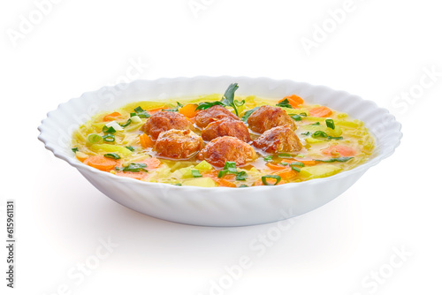 Meatballs in the potato soup. On a white background