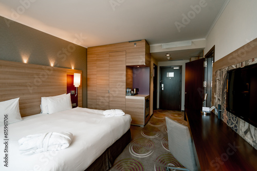 interior of a double hotel room after cleaning housekeeping bedroom rest room concept of cleanliness and hospitality travel rest
