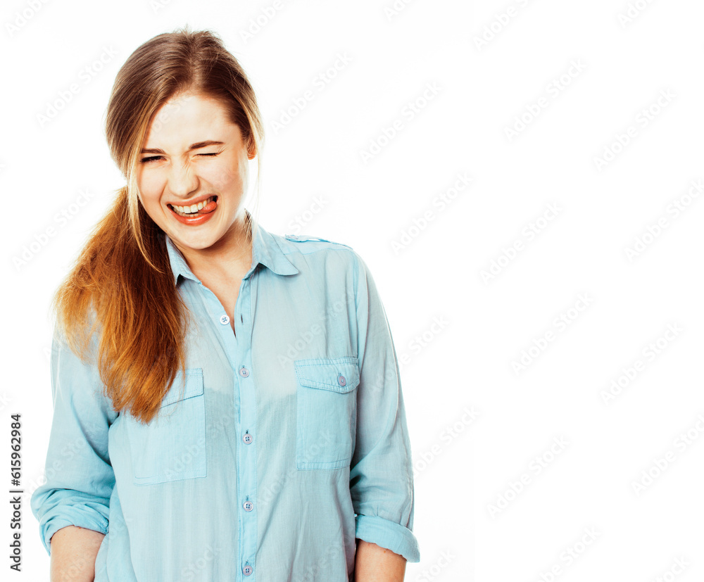 cute young woman making cheerful faces on white background, messed hair isolated cute young woman making cheerful faces on white background, messed hair isolated