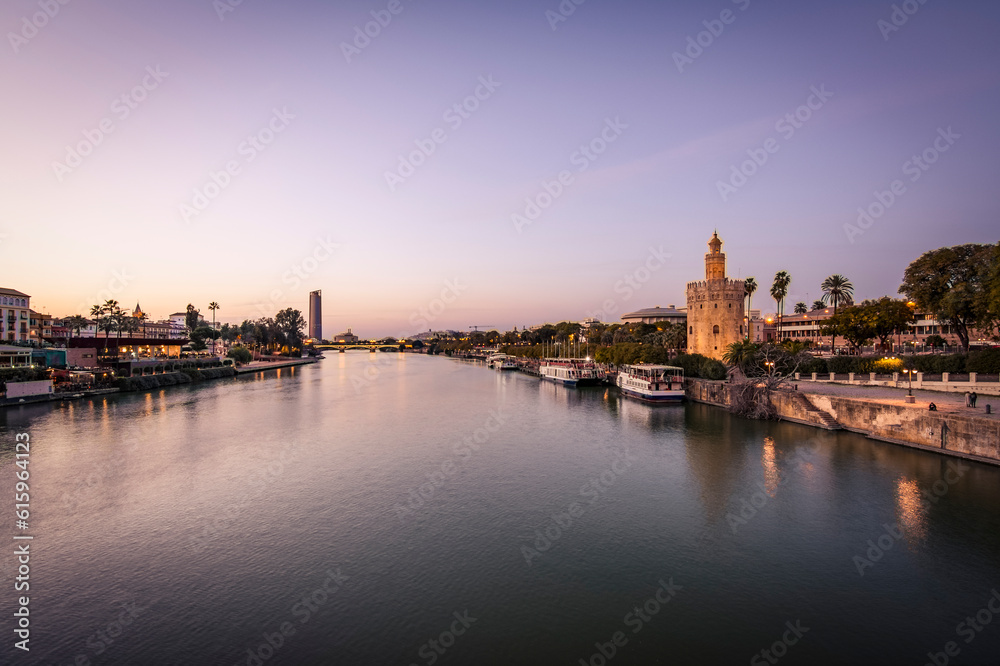 Blue Hour view Golden tower or Torre del Oro along the Guadalquivir river, Seville, Andalusia, Spain. Blue Hour view Golden tower or Torre del Oro along the Guadalquivir river, Seville, Andalusia, Spain.