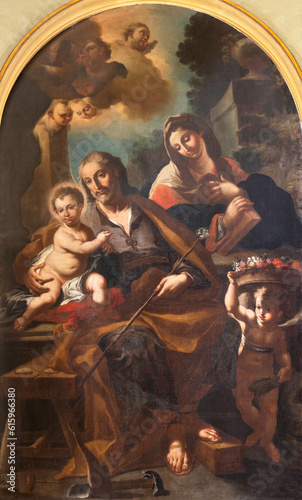 NAPLES, ITALY - APRIL 22, 2023: The painting of Holy Family in the church Basilica dell Incoronata Madre del Buon Consiglio by Domenico Guarino (1736).