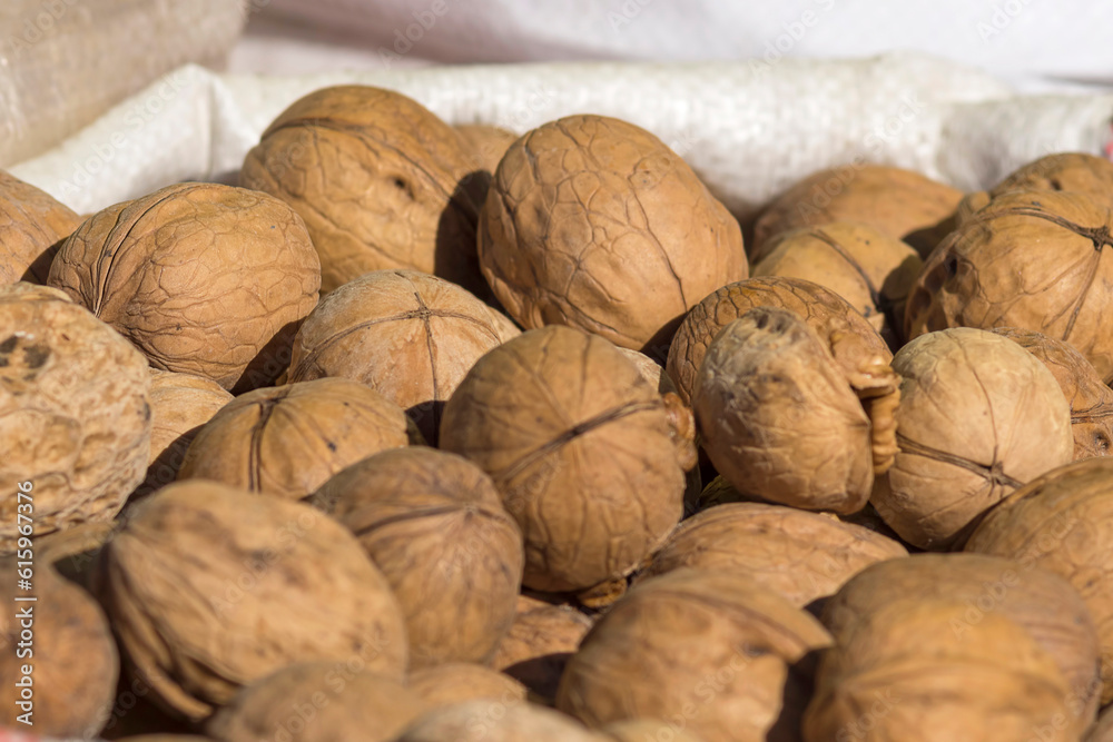 Walnut in a solid peel of brown color. They are used for cooking various dishes, halva, sweets, cakes, pastries and other sweets. Walnut in a solid peel of brown color. They are used for cooking various dishes, halva, sweets, cakes, pastries and other sweets.