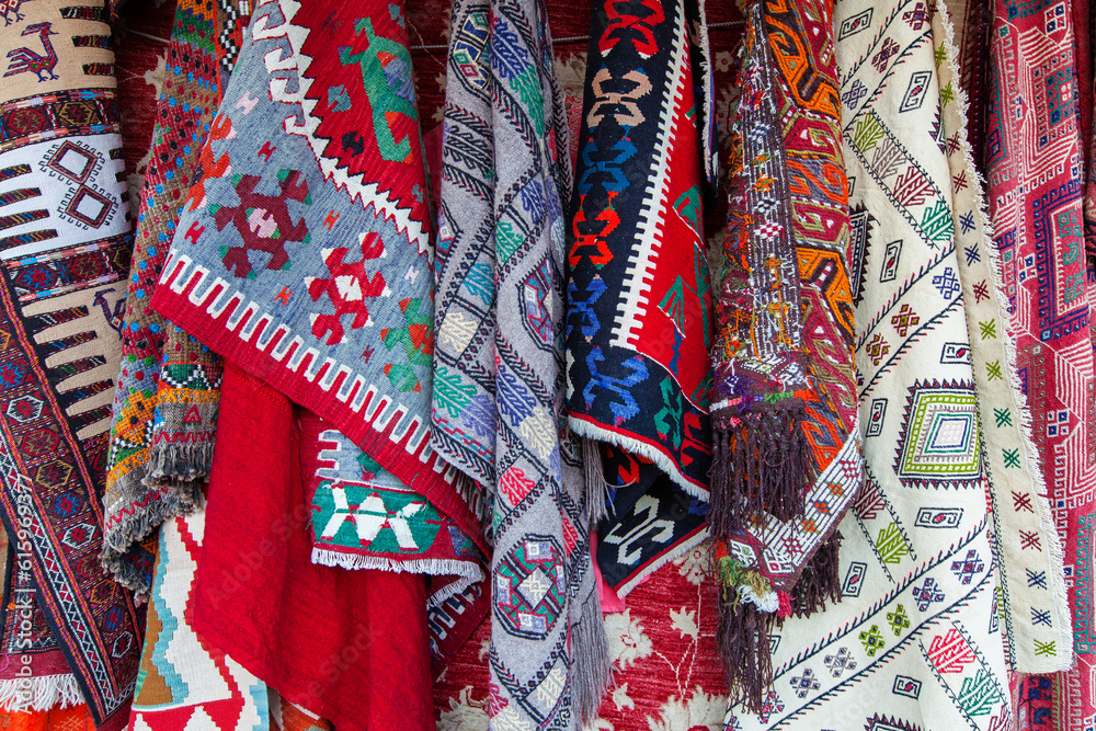 Assortment of turkish oriental carpets in street market