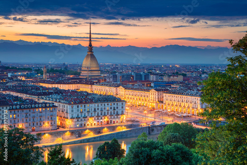 Aerial cityscape image of Turin, Italy during sunset.