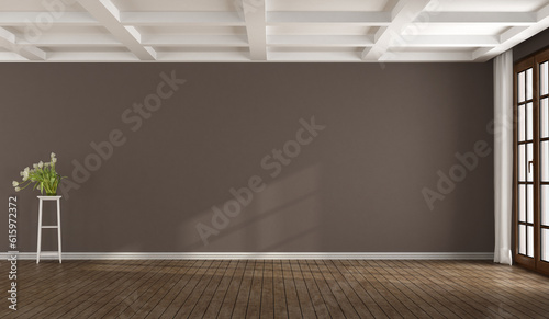 Fotografía Empty brown room with window and white coffered ceiling - 3d rendering