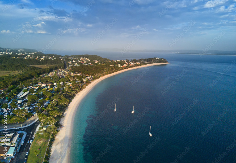 Sweeping views over Shoal Bay Port Stephens Australia.  Aerial view looking west in early morning light.
