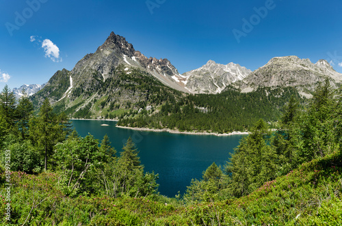 Devero Alp and lake Codelago in a beautiful day of summer season with blue sky in background, Piedmont - Italy