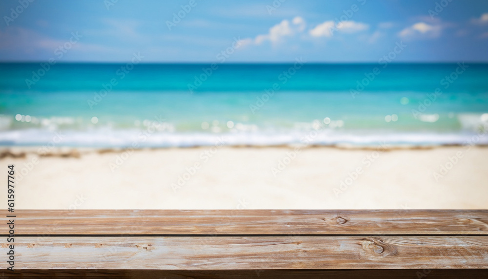 Fototapeta premium Wood table top on blurred blue sea and white sand beach background
