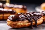Chocolate eclairs, close up. Traditional French pastry dessert