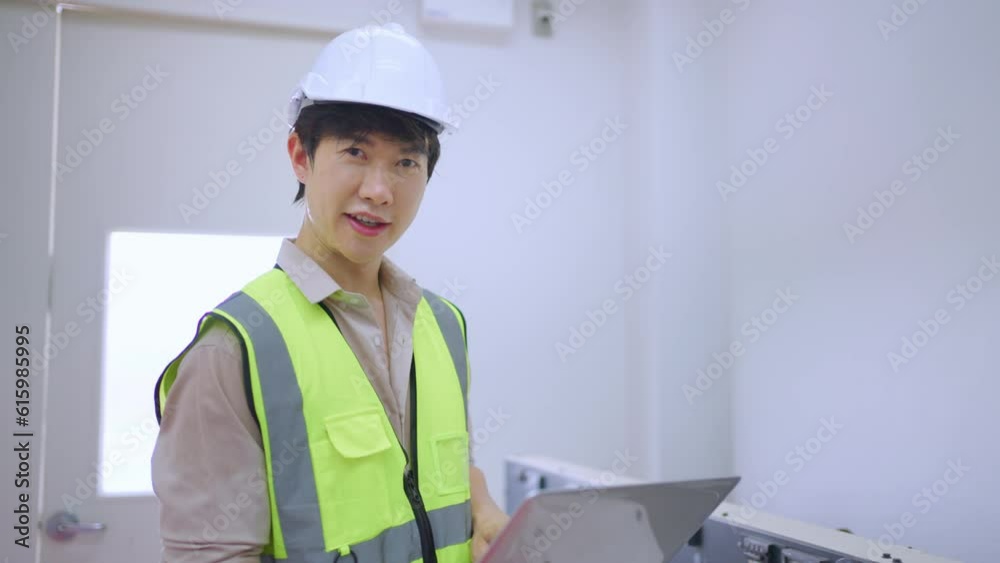 Portrait of Asian man industrial worker working in manufacturing plant. Portrait of Asian man industrial worker working in manufacturing plant.