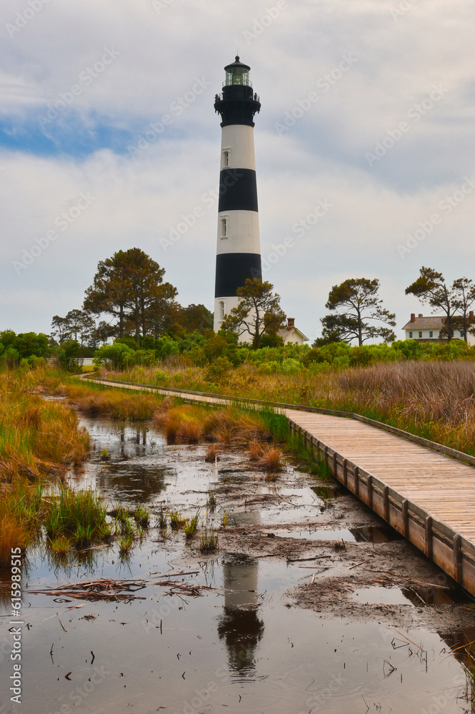 The Bodie Island Lighthouse along the boardwalk on the coast of North Carolina in HDR.