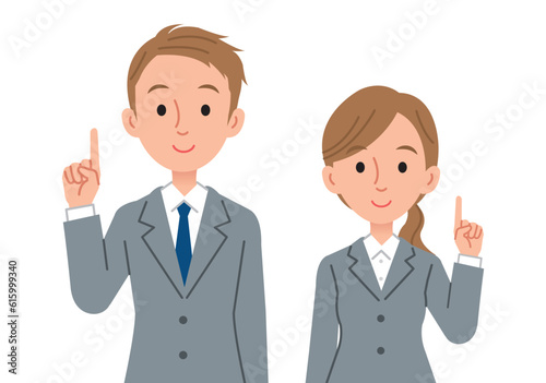 指差しで説明をするビジネスパーソン（男女）