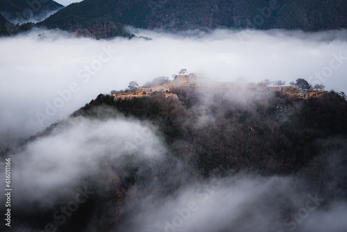 Takeda Castle of Japan with sea cloud