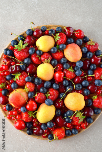 Mix of various garden berries in a plate