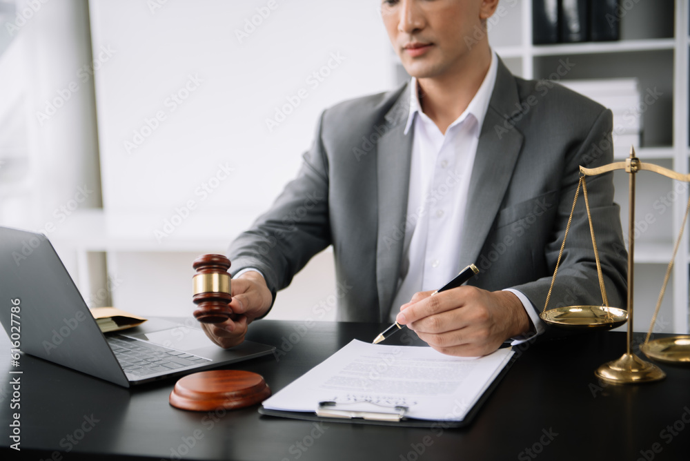 justice advice and law judge legislation concept. tribunal Attorney lawyer working with documents and white gavel on tabel justice advice and law judge legislation concept. tribunal Attorney lawyer working with documents and white gavel on tabel