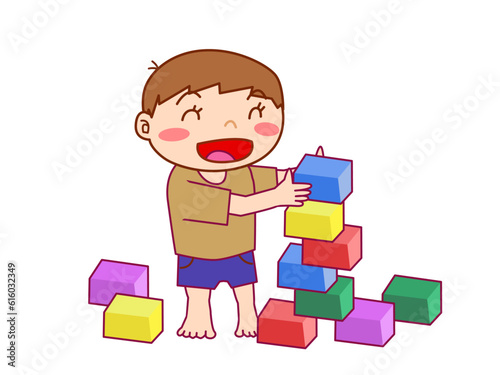 積み木ブロックを積み上げて遊ぶ男の子（私服）