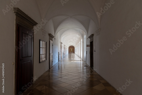 light flooded long corridor with many windows  perspective view
