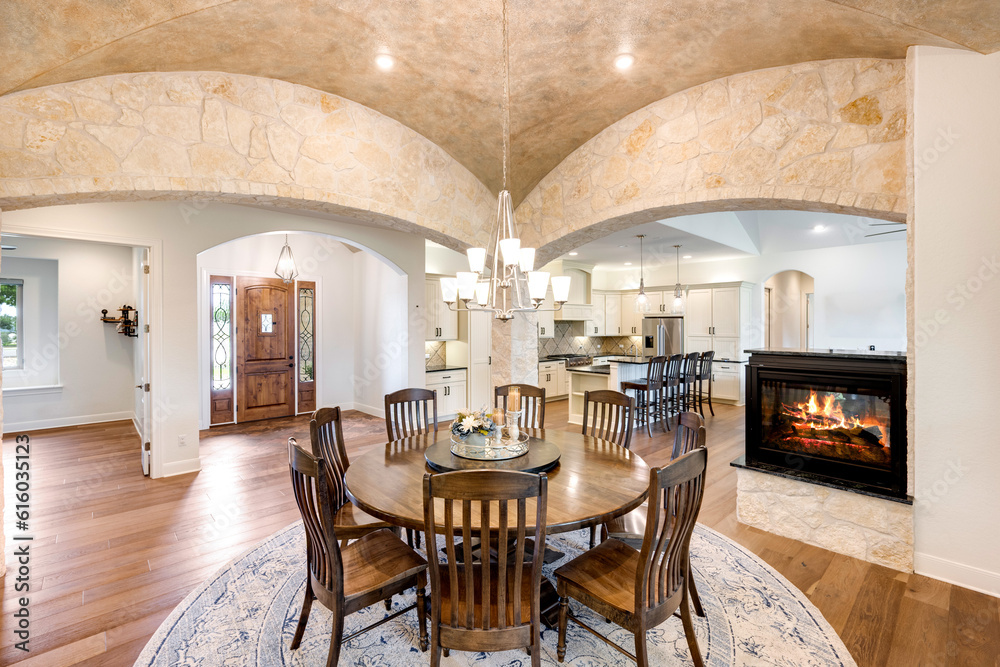 luxury dining room with faux paint and an arched dome ceiling 