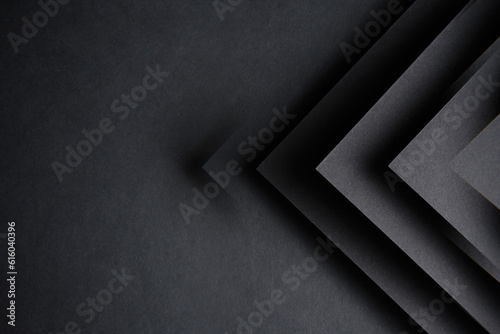 dark background on black paper with an image of triangles