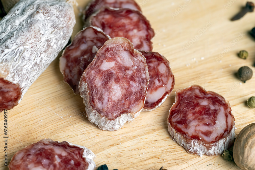 Sliced fresh pork sausage, close up Sliced fresh pork sausage, close up