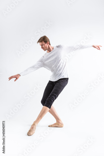 Young, handsome, sporty and athletic ballet dancer with Ballanced Hands